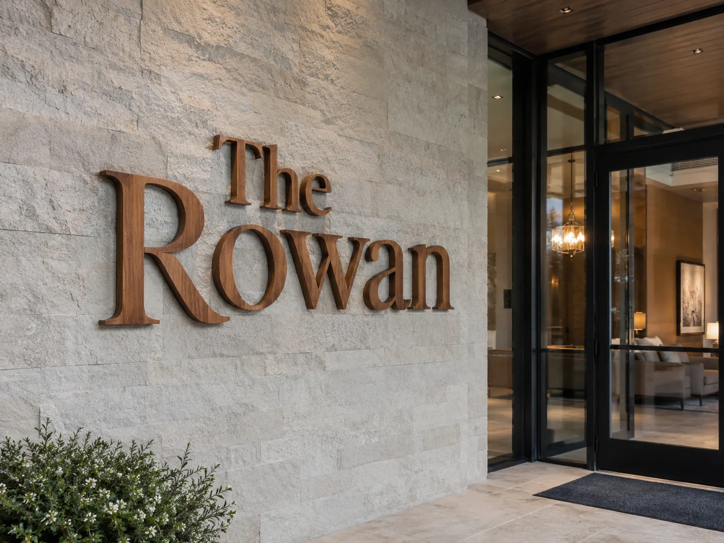 The Rowan bronze dimensional lobby sign — conceptual wood-sign and dimensional-sign design inspiration