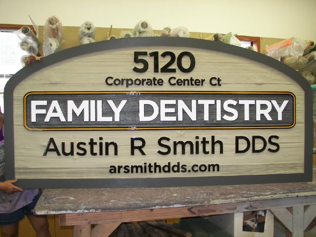 Austin R Smith Family Dentistry custom wood-look sign with carved and dimensional details