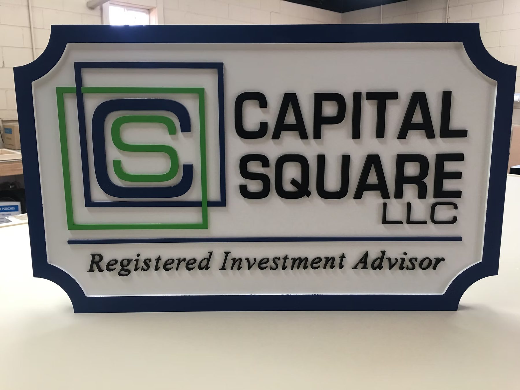 Capital Square Registered Investment Advisor custom wood-look sign with carved and dimensional details