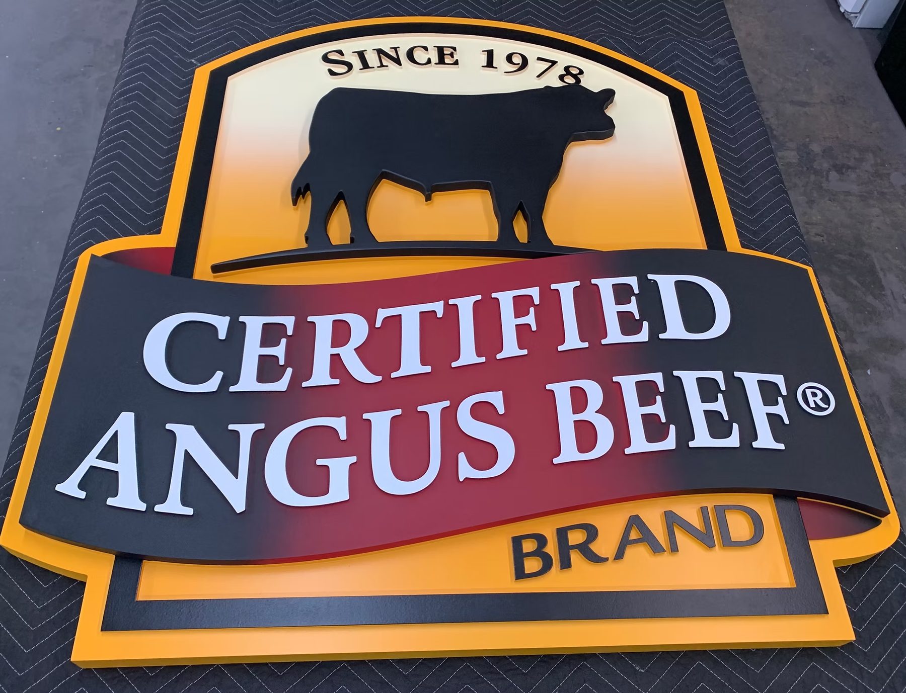 Certified Angus Beef Dimensional Logo Sign Raised Lettering custom wood-look sign with carved and dimensional details