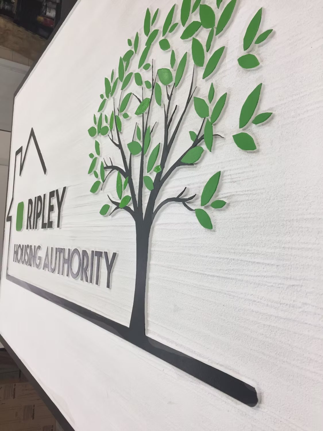 Community Tree Logo Dimensional Wall custom wood-look sign with carved and dimensional details