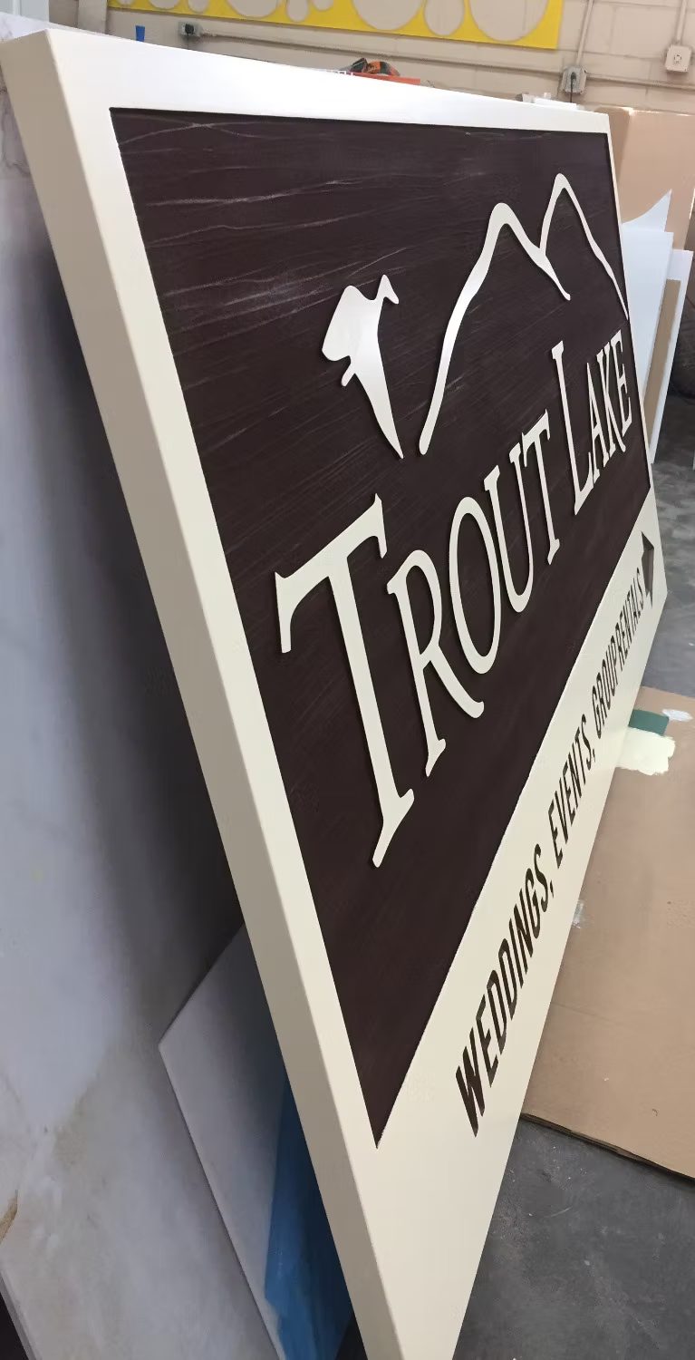Custom Hanging Property custom wood-look sign with carved and dimensional details