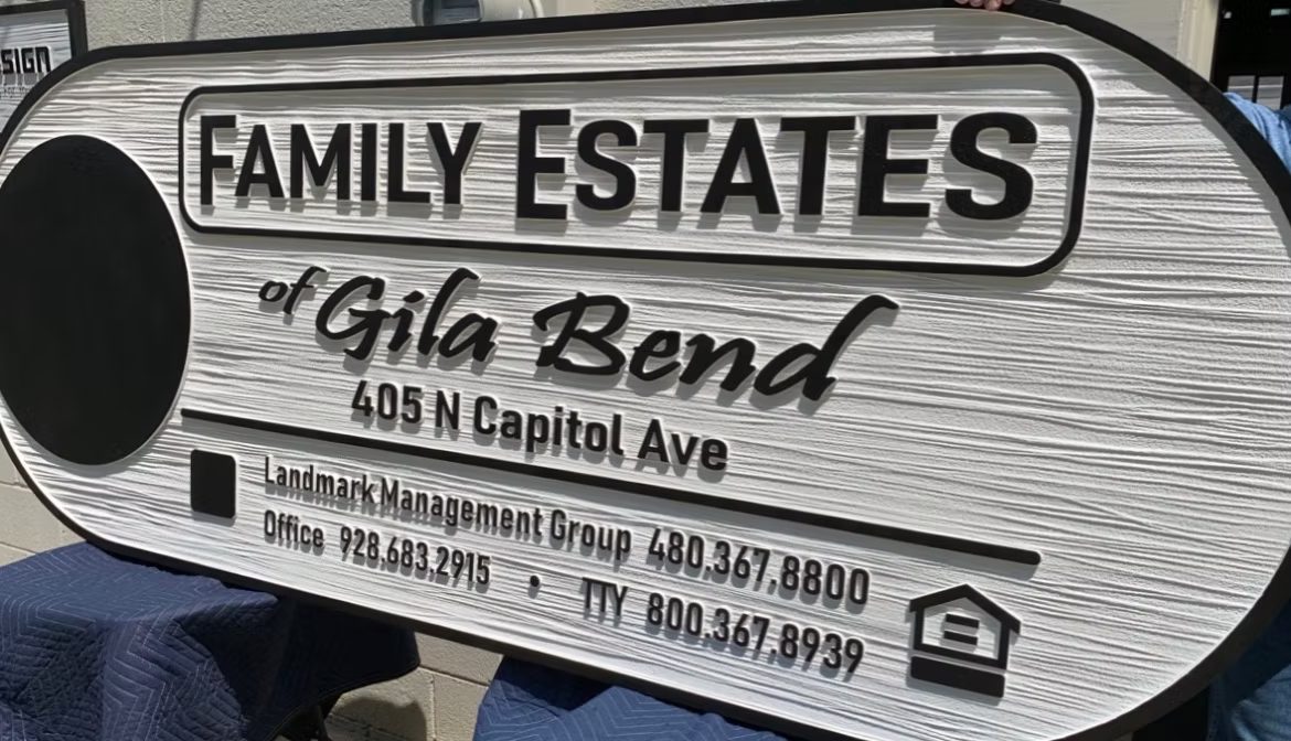 Family Estates Gila Bend Ranch custom wood-look sign with carved and dimensional details
