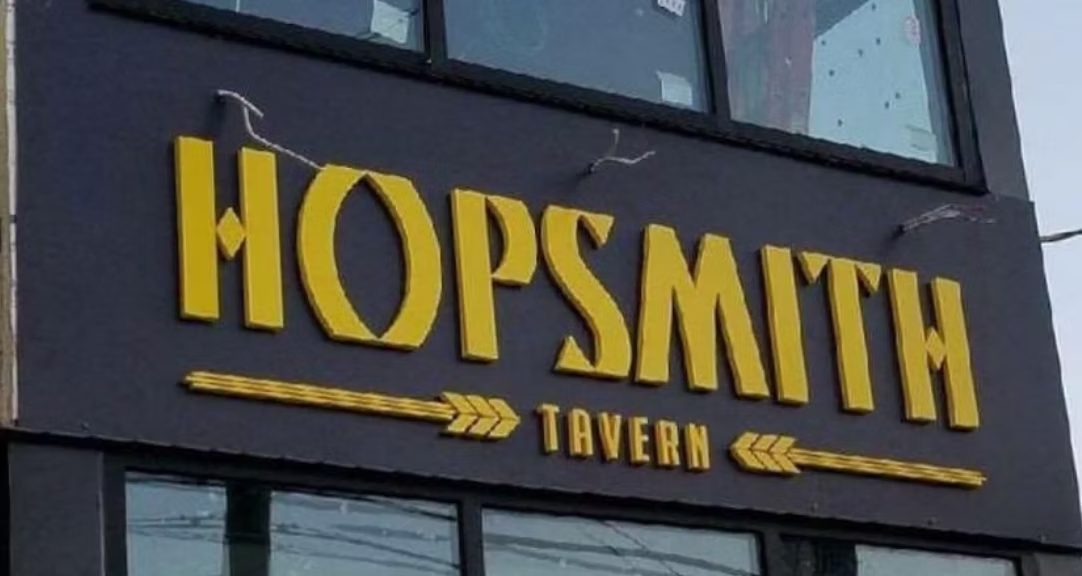 Hopsmith Tavern Dimensional Building Sign Letters custom wood-look sign with carved and dimensional details