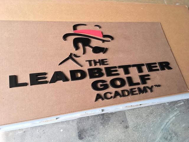 Leaderbetter Golf Academy custom wood-look sign with carved and dimensional details