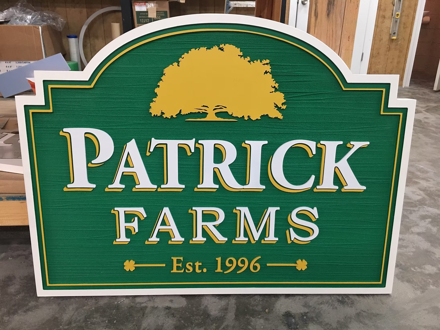Patrick Farms Community custom wood-look sign with carved and dimensional details