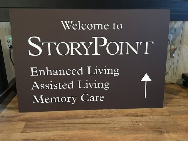 Storypoint Assisted Living custom wood-look sign with carved and dimensional details
