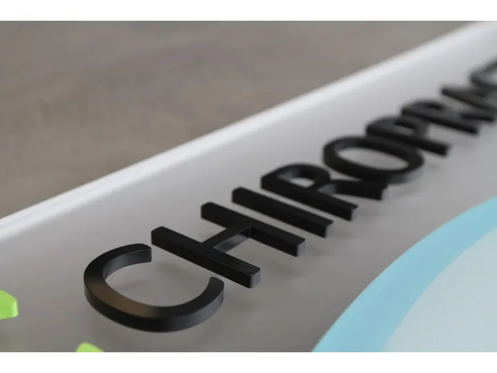 Black Dimensional Chiropractic Sign Letters custom wood-look sign