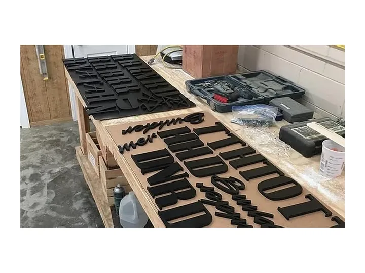Black Dimensional Letters Production Bench custom wood-look sign