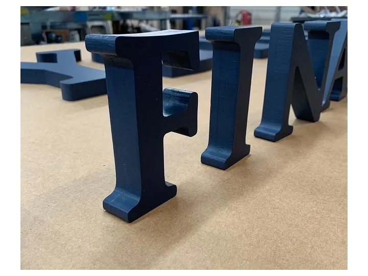 Blue Dimensional Letter Components custom wood-look sign