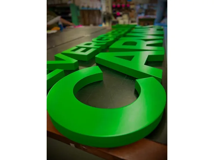 Bright Green custom wood-look sign