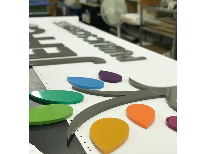 Colorful Layered Logo Components Gray Letters custom wood-look sign