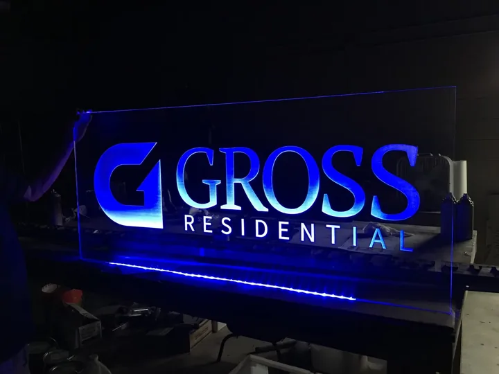 Gross Residential Illuminated custom wood-look sign