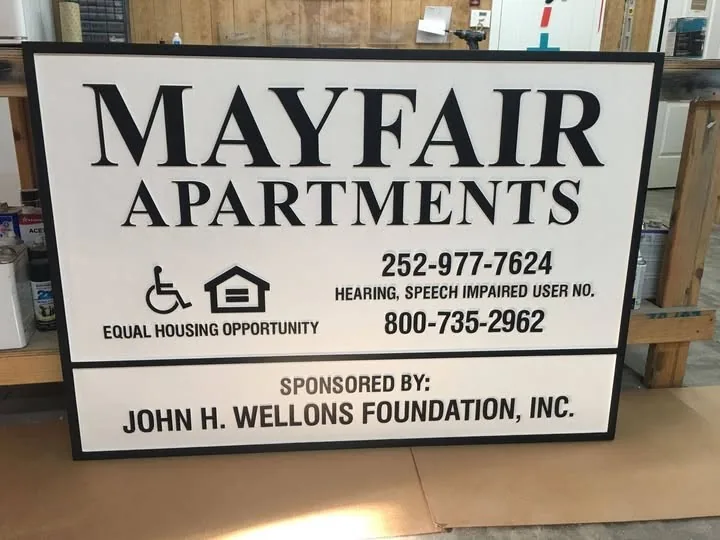 Mayfair Apartments Property Information custom wood-look sign