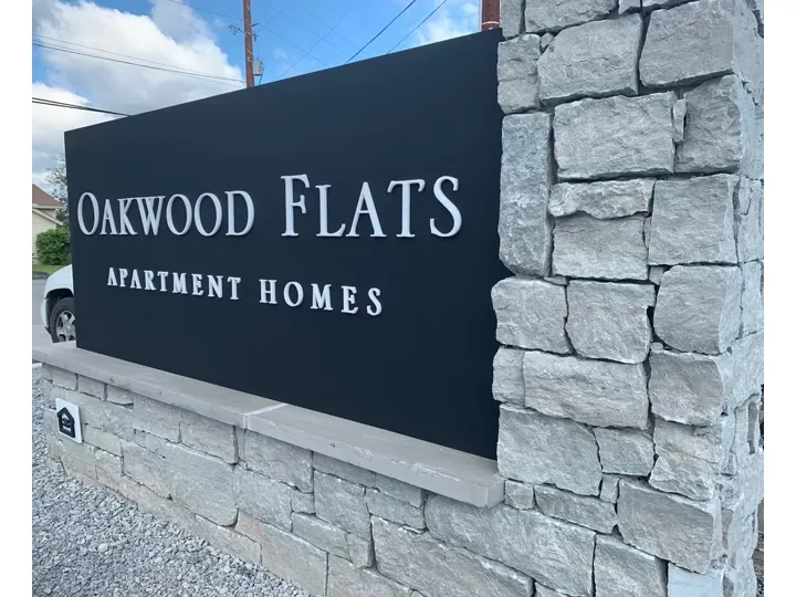 Oakwood Flats Apartment custom wood-look sign