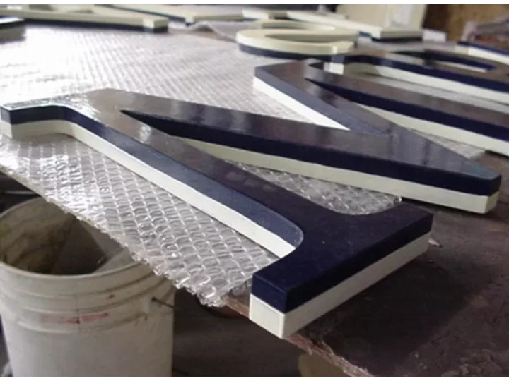 Dimensional Sign Letters During Shop Fabrication custom wood-look sign