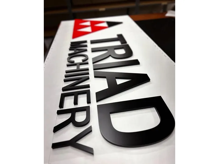 Triad Machinery custom wood signage